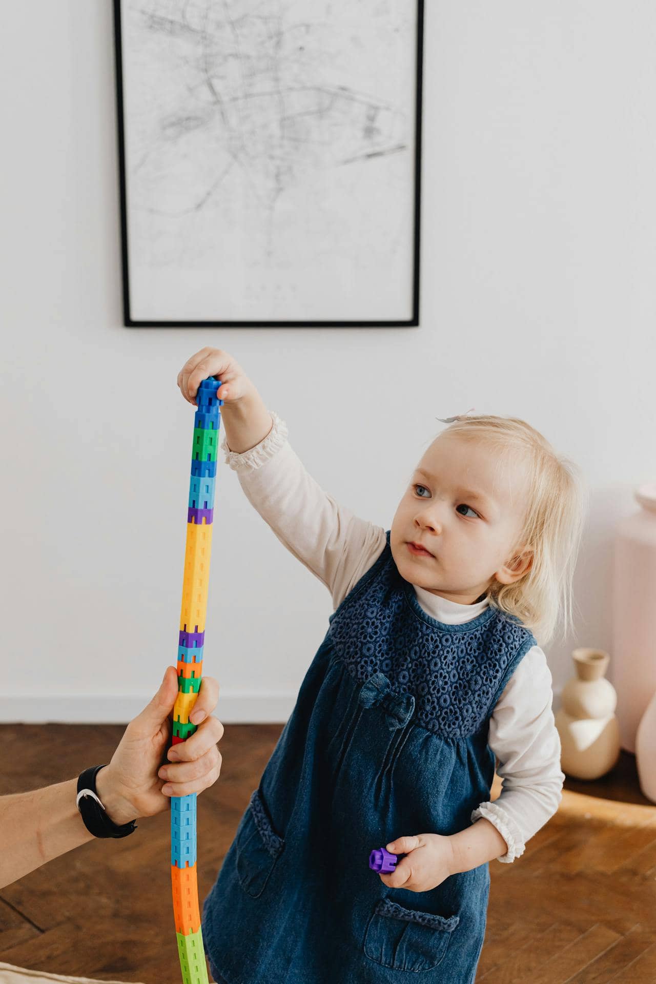 child stacking blocks
