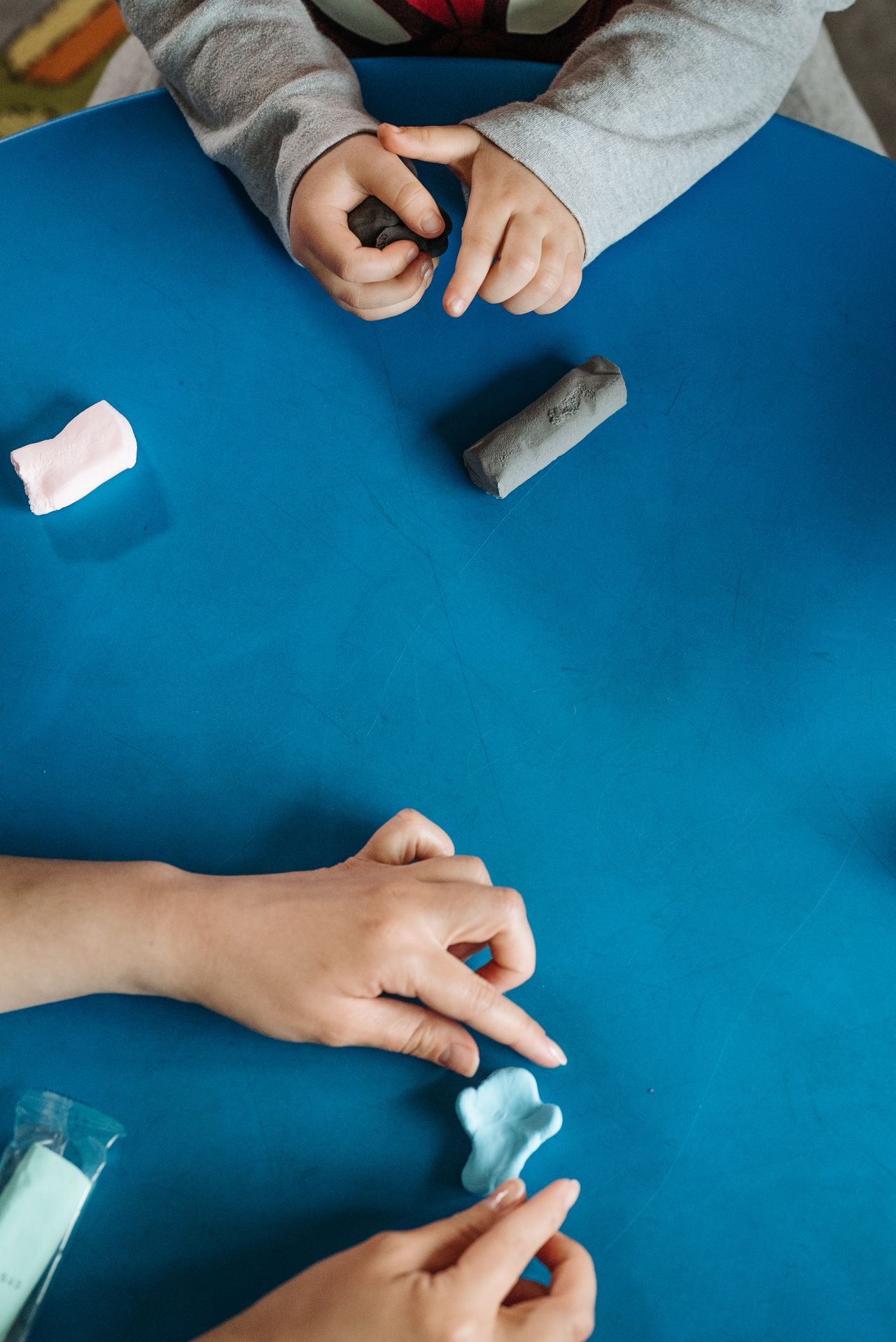 Fine motor studio with wooden letters and play materials